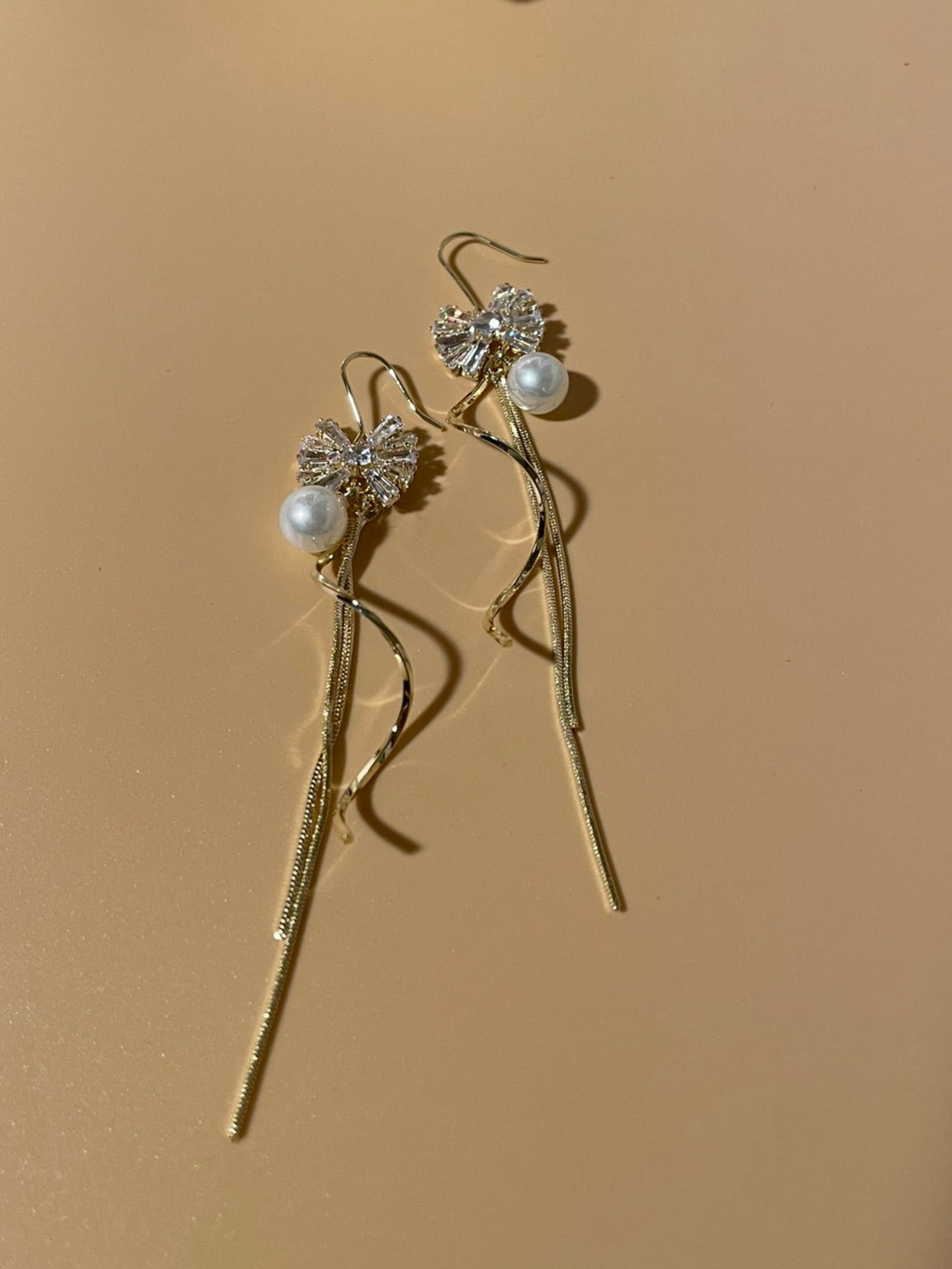 Crystal Bow Spiral Drop Earrings